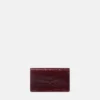 Medusa ’95 Croc-Effect Clutch